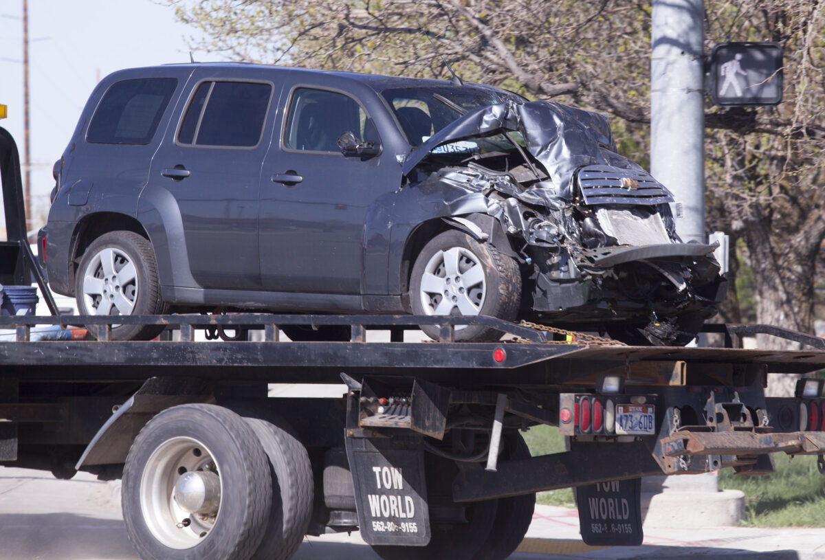 Man pinned in overturned car after crash in Ogden News, Sports, Jobs